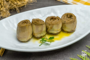 Alcachofas confitadas. Receta para que salgan tiernas