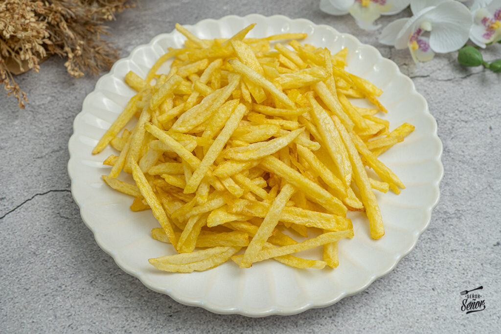 Cómo hacer patatas paja. Receta para que salgan muy crujientes